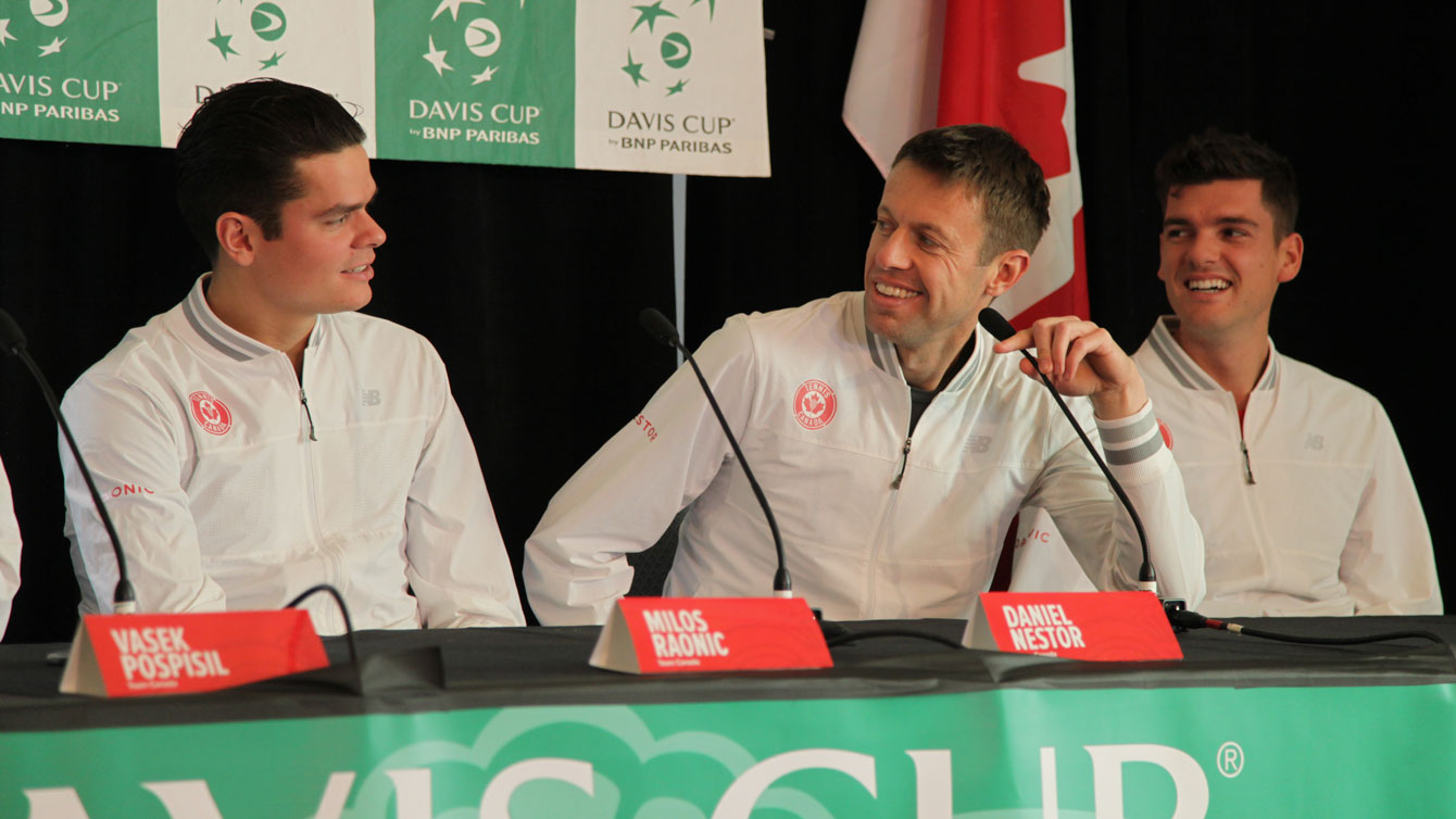 "What was the question?" Daniel Nestor (centre) has a laugh with Frank Dancevic (right) and Milos Raonic looking on at the Canada-Japan Davis Cup draw.
