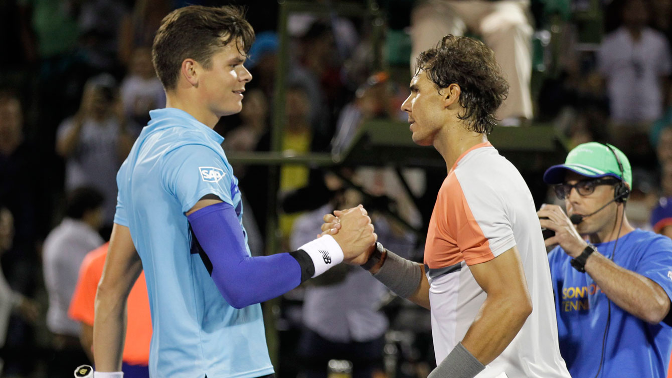 Milos Raonic and Rafael Nadal shake hands after the Spaniard beat the Canadian in Miami late 2014. 