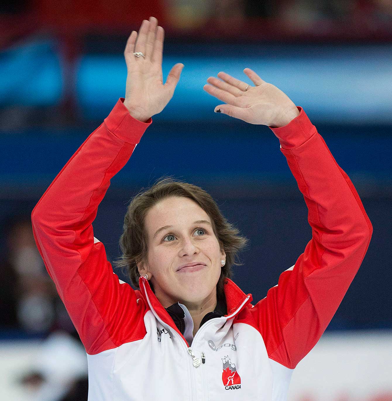Marianne St-Gelais from Canada waves to fans after finishing second in the women's 500-metre final race at the ISU World Cup Short Track Speedskating competition in Montreal, Saturday, November 15, 2014. THE CANADIAN PRESS/Graham Hughes