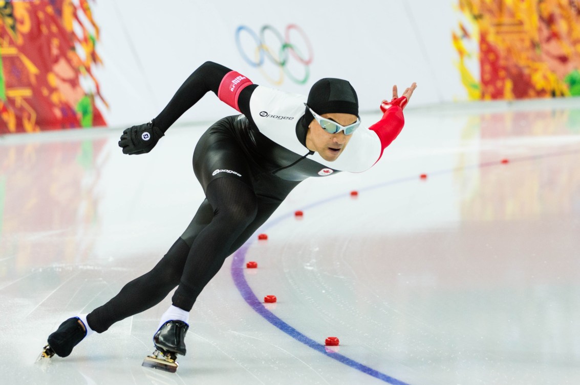 Gilmore Junio comes around a corner in a speed skating race