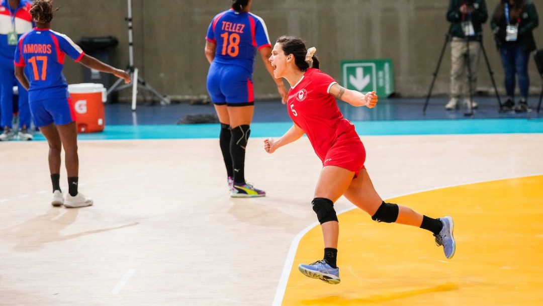 Myriam Laplante celebrates as she runs across the court