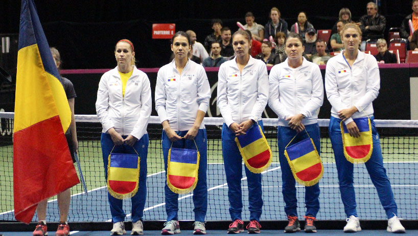 The Romanian team lines up at Fed Cup. Irina-Camelia Begu is on the right, she faced off against Canada's Francoise Abanda in the first rubber of the tie on April 18, 2015.