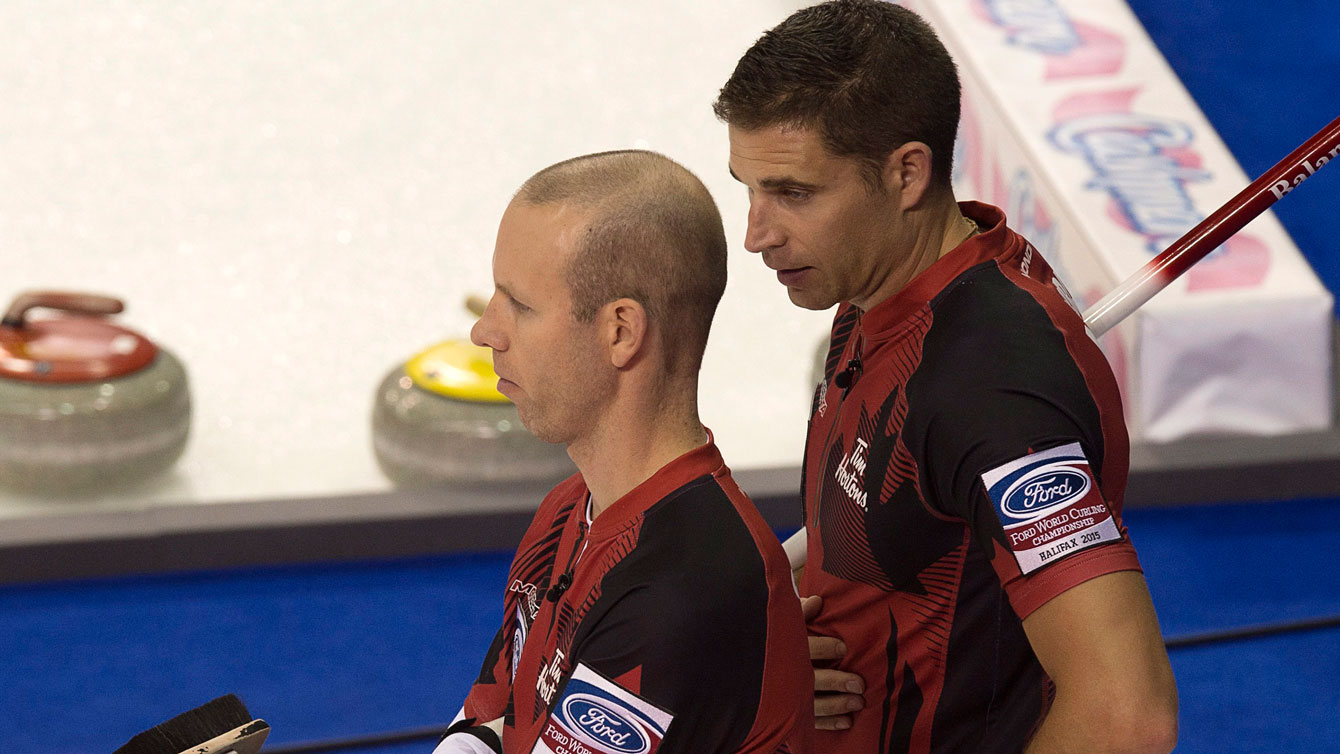 Pat Simmons (left) and John Morris at the 2015 curling men's World Championship in Halifax. 
