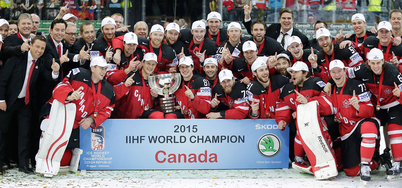 Canadian men accept the trophy at the 2015 IIHF World Championship. 