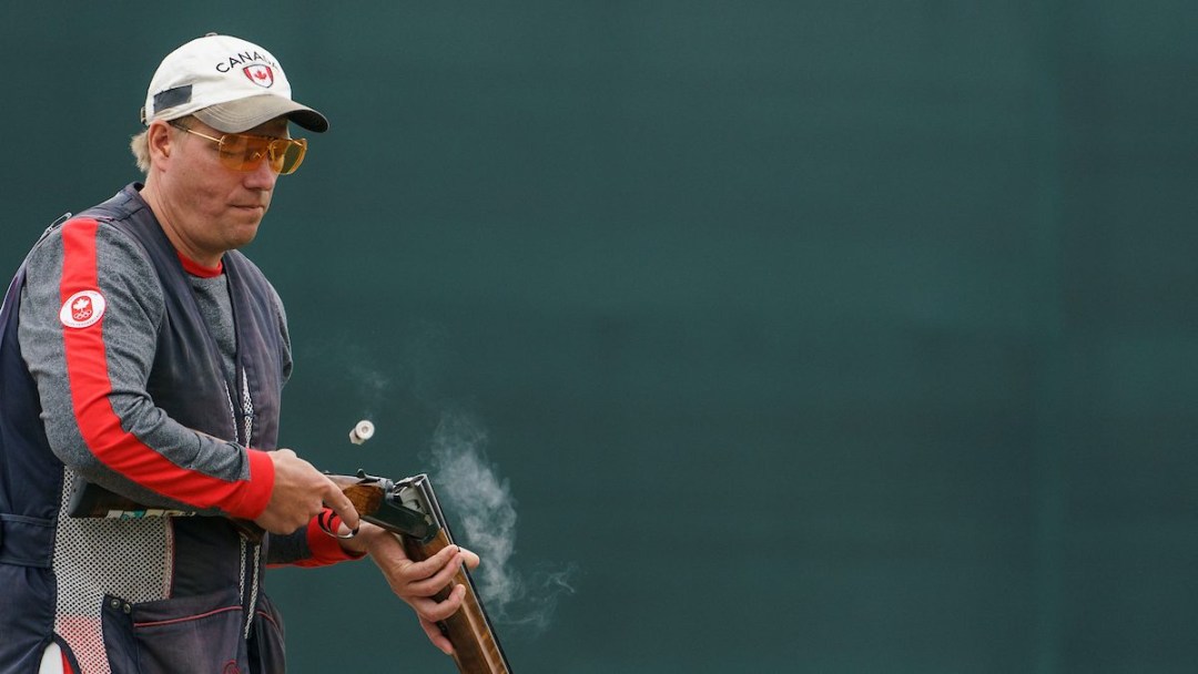 Curtis Wennberg ejects a cartridge from his shotgun