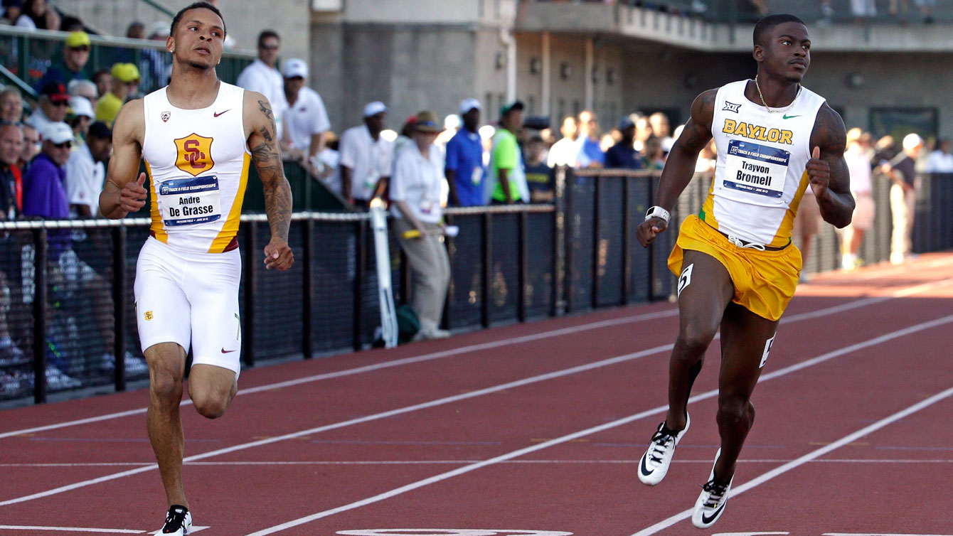 Andre De Grasse (left) and Trayvon Bromell in the NCAA Track and Field Championships semifinals on June 10, 2015. 