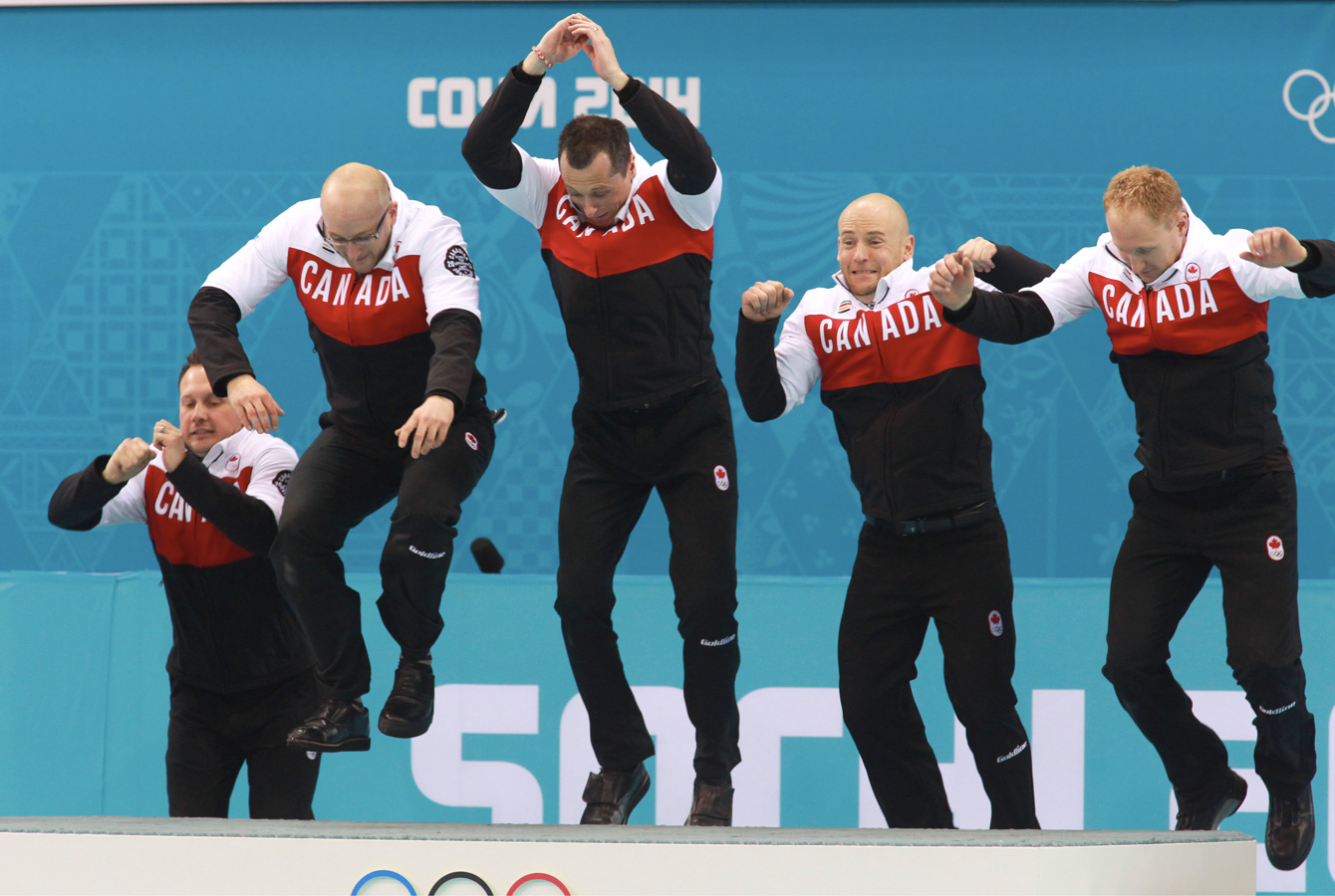 Team Brad Jacobs celebrates gold at Sochi 2014 Olympic Games.