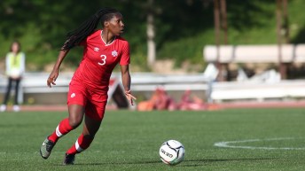 Kadeisha Buchanan with the ball on the pitch