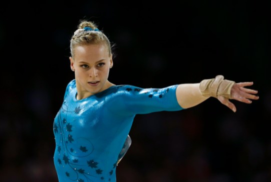 Ellie Black Canada's Ellie Black performs the floor exercise during women's artistic gymnastics all-around competition in the Pan Am Games in Toronto, Monday, July 13, 2015. Black won the gold medal in the event. (AP Photo/Gregory Bull)