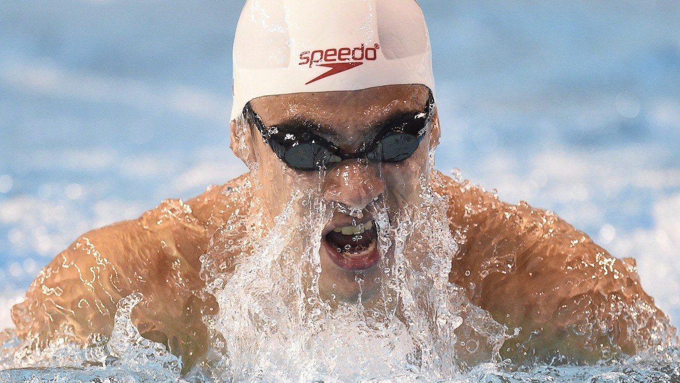 Richard Funk of Canada swims his way to a bronze medal in the men's 100m breaststroke final swimming event at the 2015 Pan Am Games in Toronto.