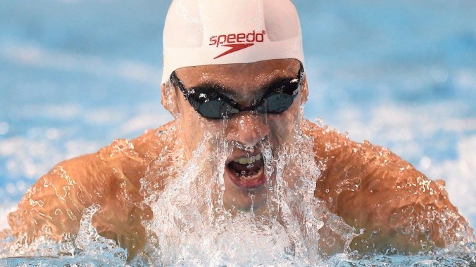 Richard Funk of Canada swims his way to a bronze medal in the men's 100m breaststroke final swimming event at the 2015 Pan Am Games in Toronto.
