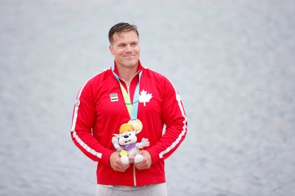 Canada’s Mark De Jonge celebrates his gold medal