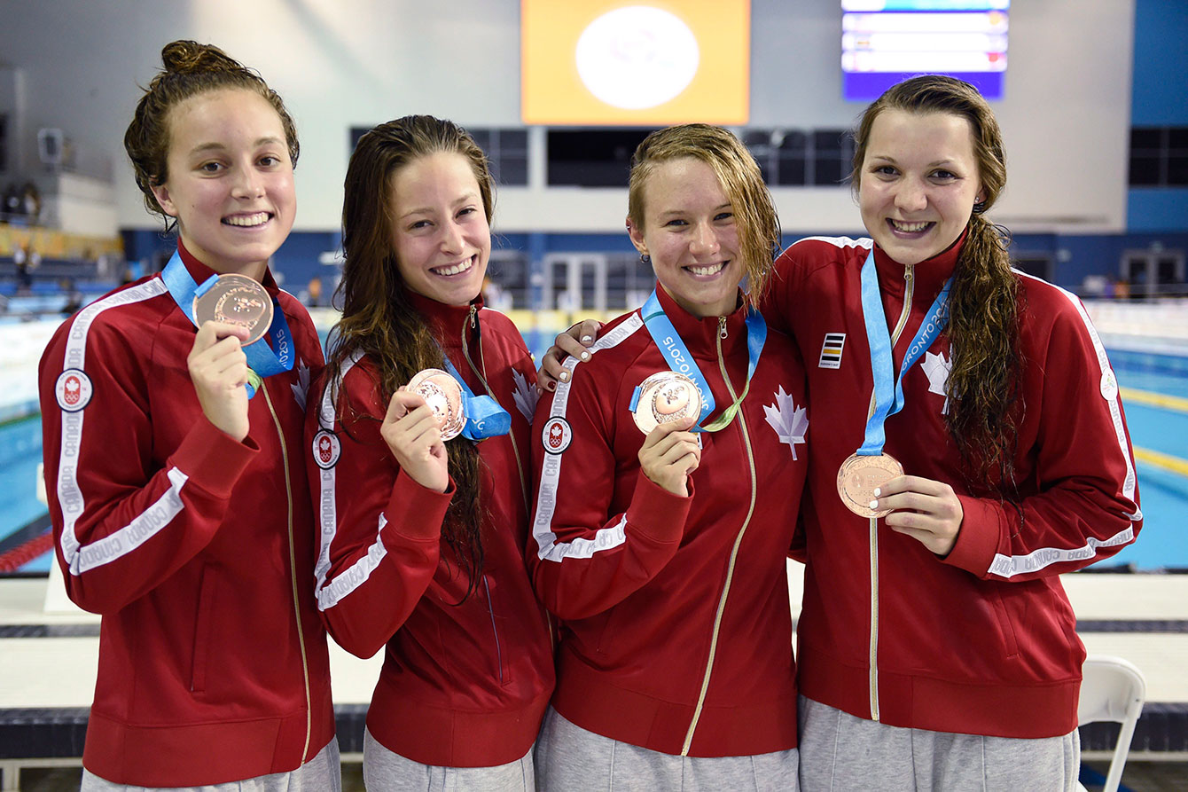 Canada's 4x200m freestyle relay with their TO2015 bronze medals. Emily Overholt (from left), Katerine Savard, Alyson Ackman, and Brittany Maclean. 