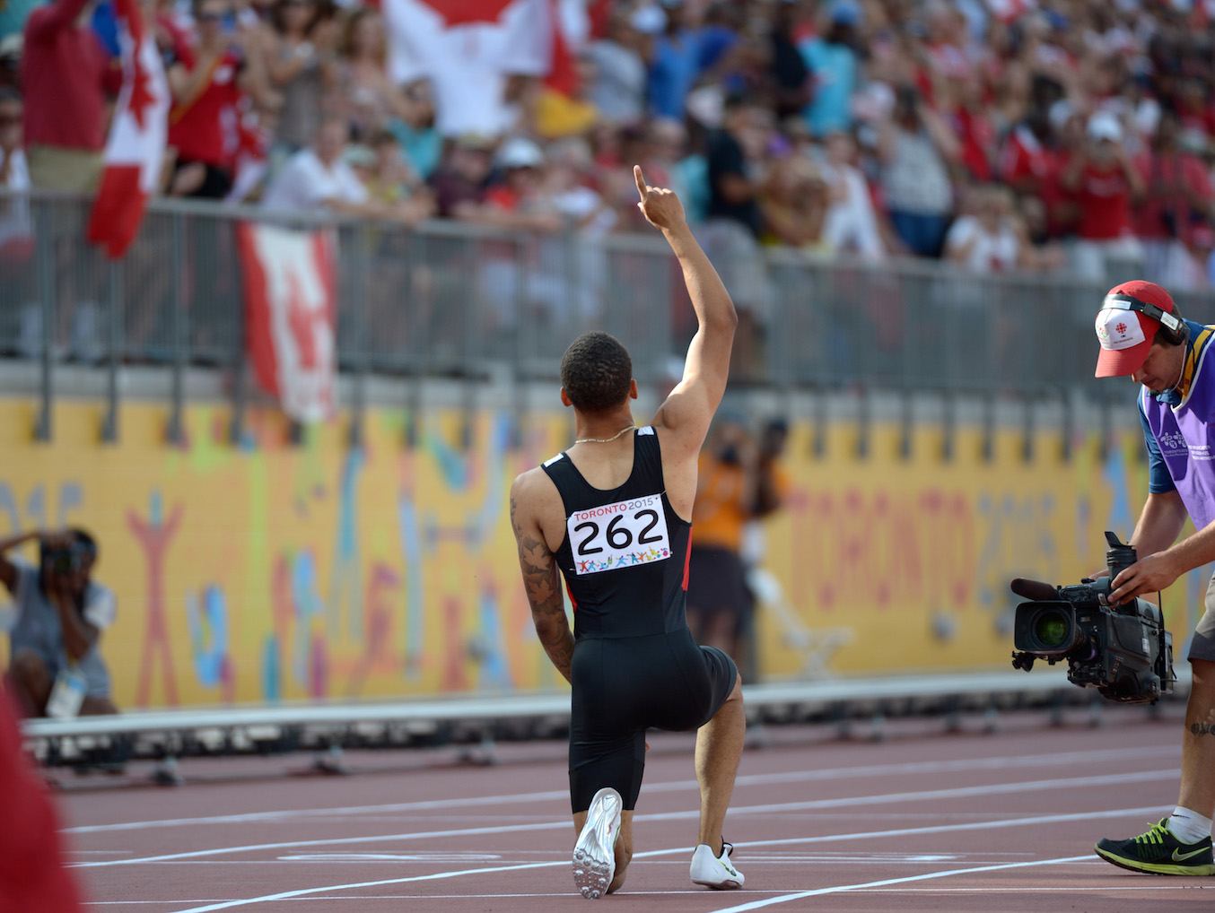 Andre De Grasse celebrating