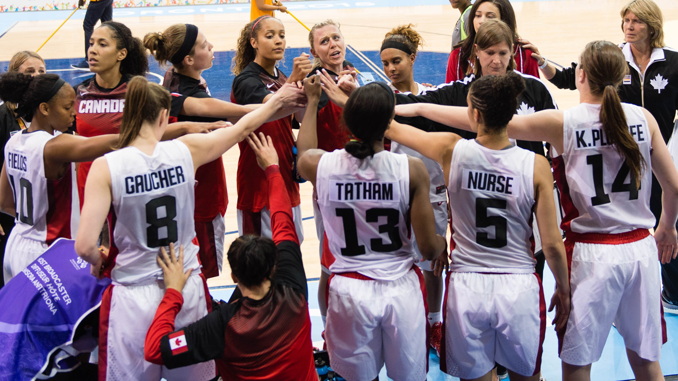 Canada Basketball women's team 'hands-in' against Venezuela at Toronto 2015 Pan American Games. 