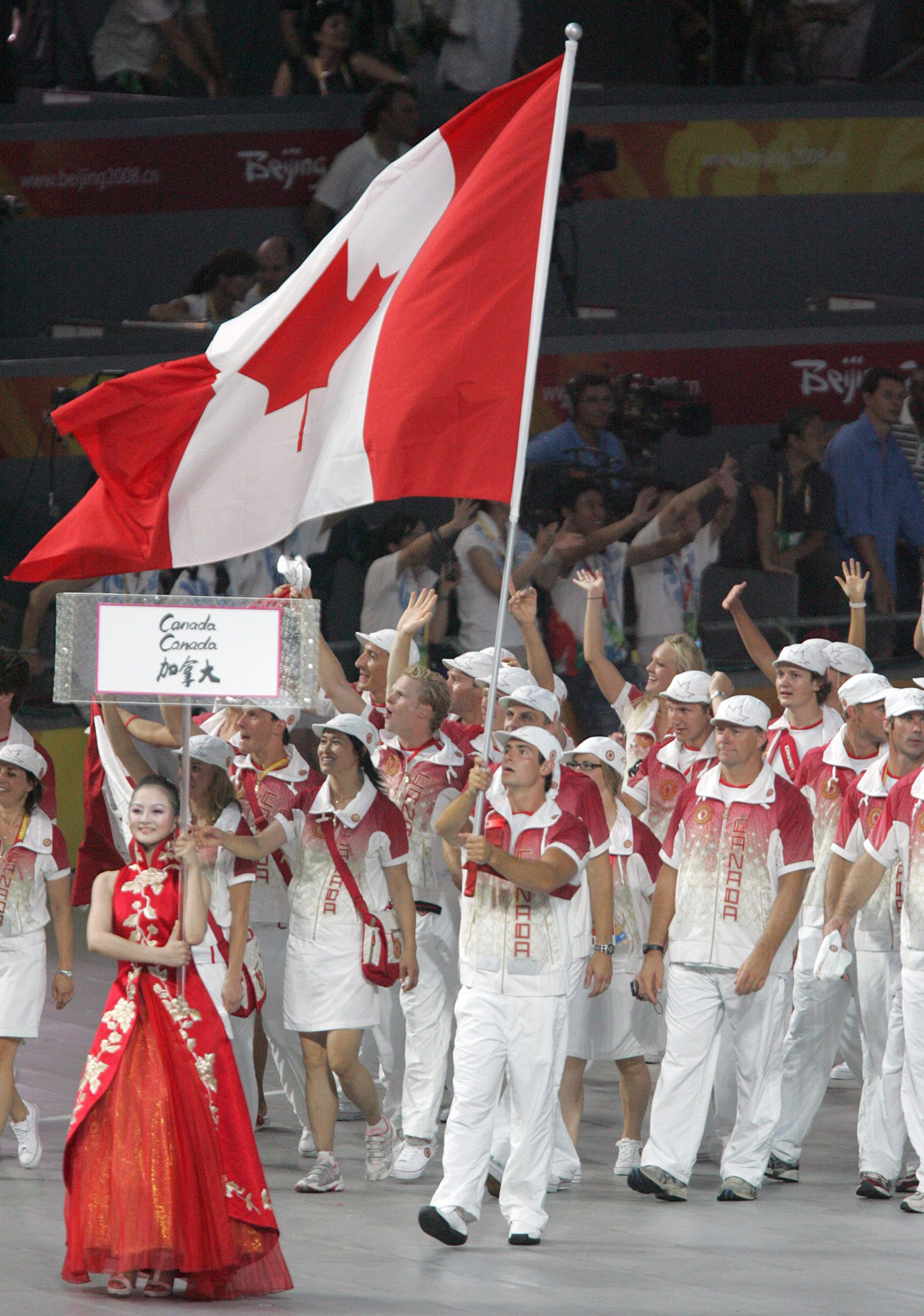 Adam van Koeverden leads Canada into the Bird's Nest at Beijing 2008 Opening Ceremony.