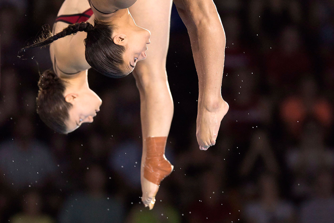 Roseline Filion (l) and Meaghan Benfeito compete in the 10m synchro platform final at TO2015.