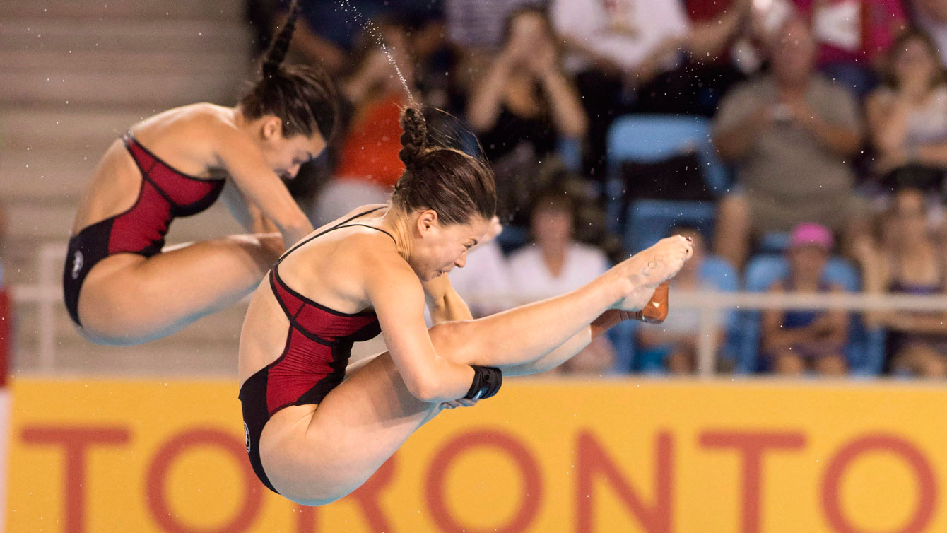 Meaghan Benfeito (left) and Roseline Filion in action at Toronto 2015 Pan Am Games. 