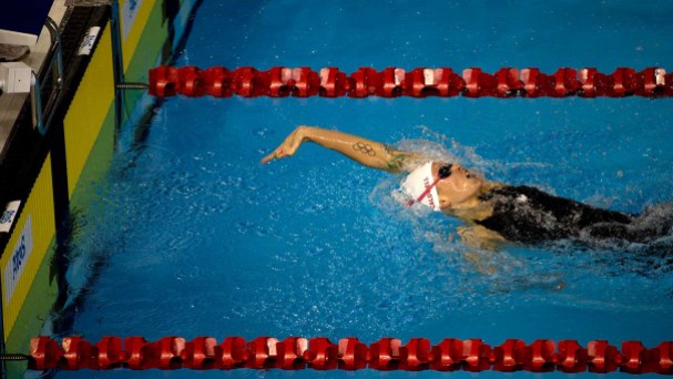Hilary Caldwell Canada's Hilary Caldwell reaches for the wall to win the women's 200m backstroke.