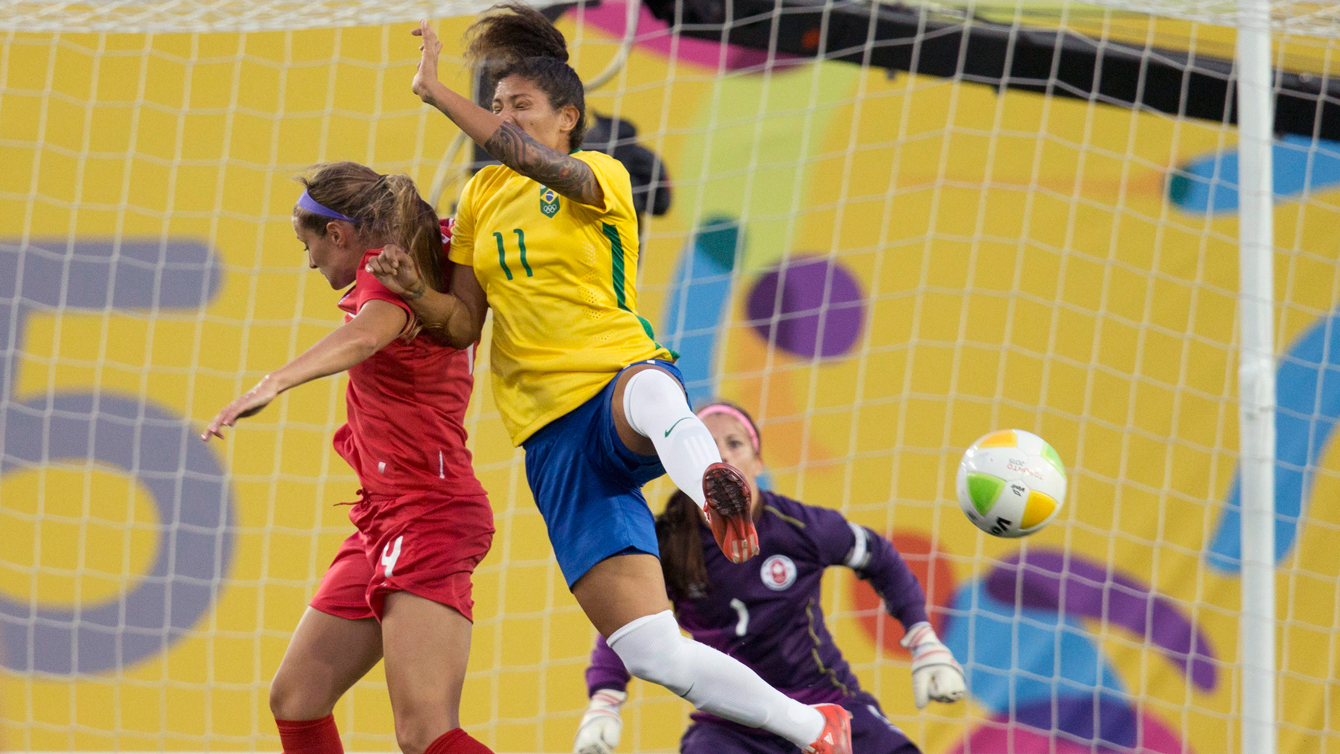 Shelina Zadowsky goes up for a ball against Brazil during Pan Am Games football on July 19, 2105. 