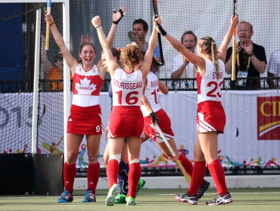 Canada's Women's Field Hockey team cheering during the Bronze Medal Game