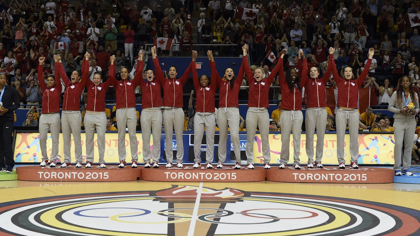 Team Canada's women's basketball team celebrates winning gold