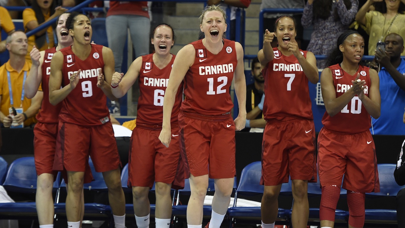 Team Canada's women's basketball team celebrates winning gold