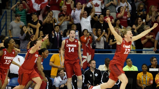 Team Canada's women's basketball team celebrates winning gold