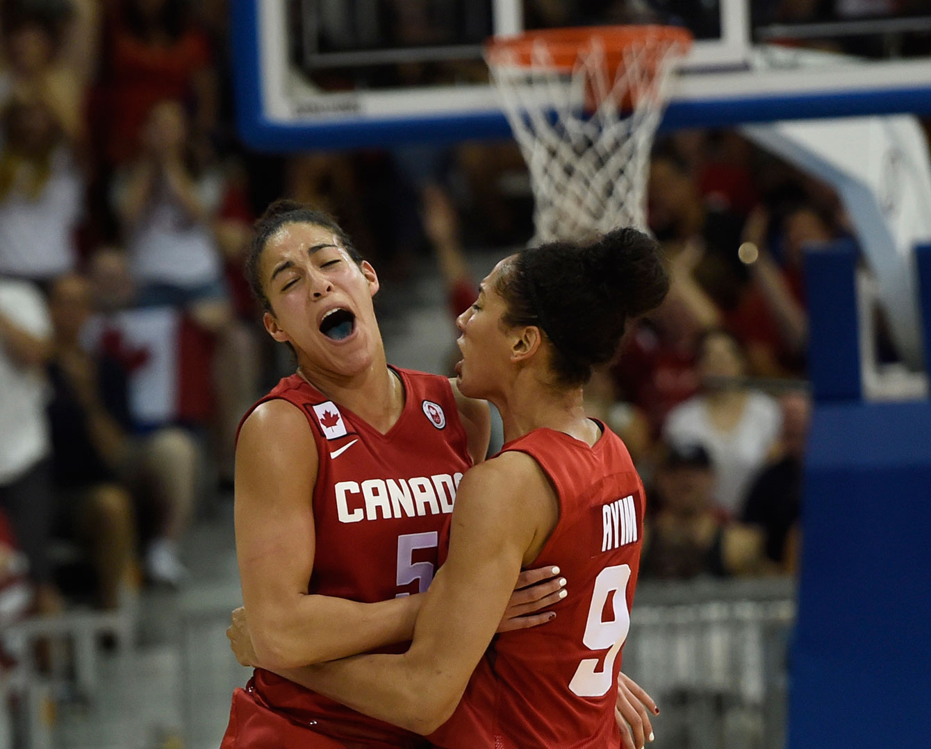 Kia Nurse (left) and Miranda Ayim celebrate during the gold medal game versus the United States at TO2015.