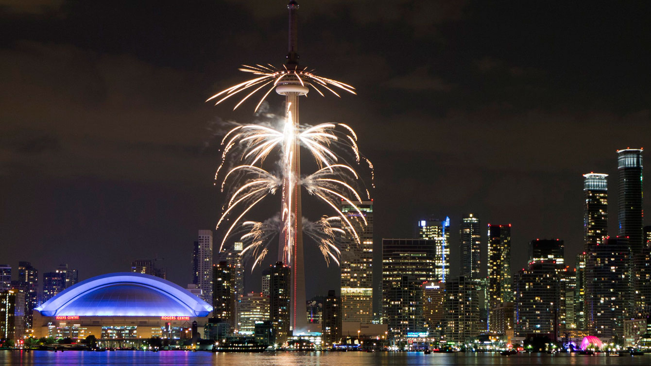 Toronto's most recognized landmark, the CN Tower, lights up for the Opening Ceremony of the Pan American Games taking place in Rogers Centre (Pan Am Dome) on July 10, 2015.