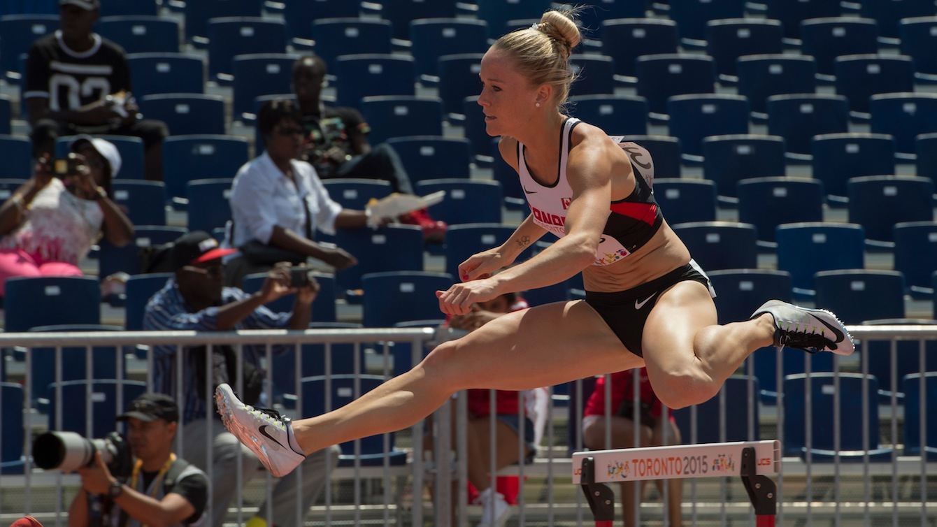 Sarah Wells competes in the women's 400m hurdles