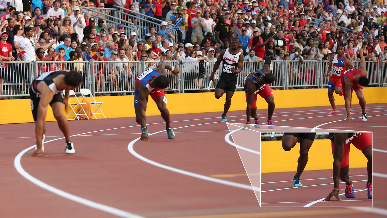 Photo appears to show Gavin Smellie stepping on the line separating lanes seven and eight ever so slightly during men's TO2015 4x100m final. Canada crossed the finish line in Pan Am Games record time, however this singular incident was reportedly protested by three countries that stood to benefit at Canada's expense. (Photo: Alexandra Fernando)