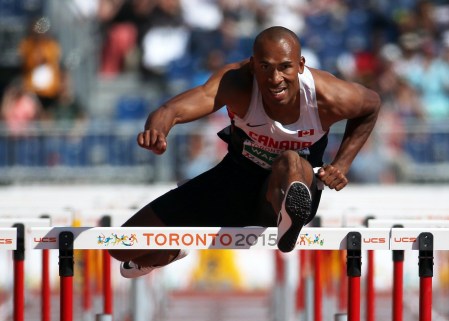 Damian Warner wins the hurdles before taking the decathlon gold in Canadian and Pan Am Games record-breaking fashion (COC photo by Greg Kolz).