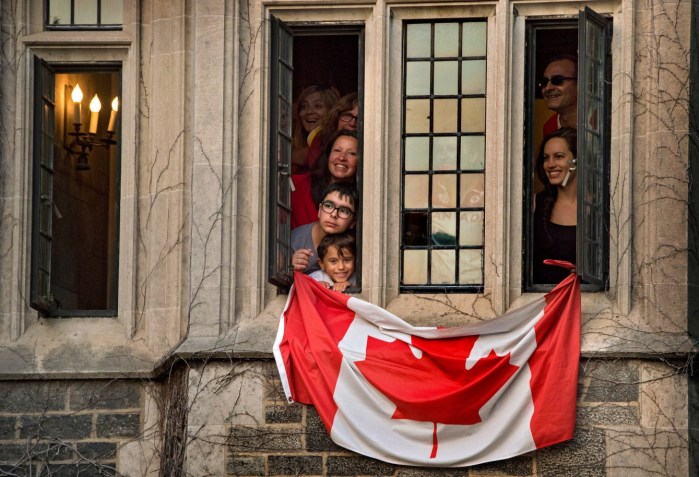 Field hockey onlookers at the University of Toronto during the Pan Am Games (COC Photo by Jason Ransom).