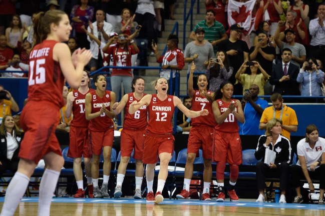 Canadian players celebrate a basket against USA at the Pan Am Games on July 20, 2015.