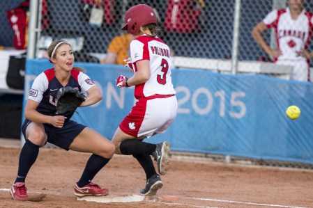 Erika Polidori, Team Canada softball - TO2015 Erika Polidori safely makes it to first base in the game against the United States on July 24, 2015 (Jeffrey Sze/COC)