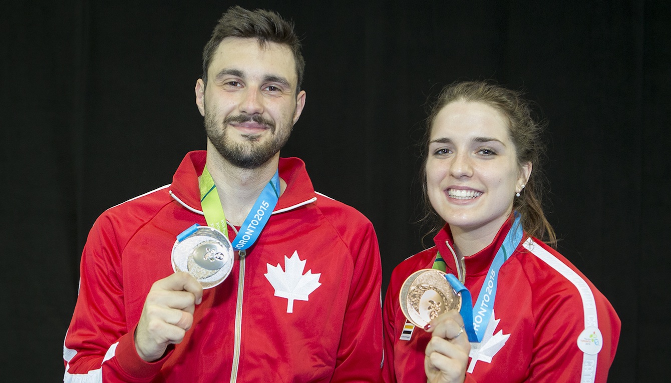 Joseph Polossifakis and Gabriella Page pose with their medals