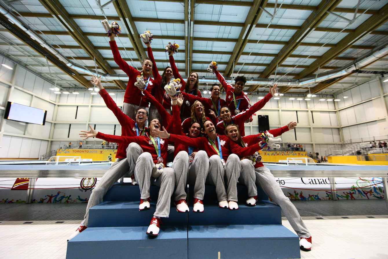 Team Canada's poses for a group photo with their silver medals after the ceramony.