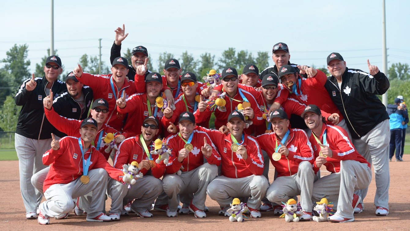 Canadian men's softball team takes gold in the final match against Venezuela. Photo by Winston Chow