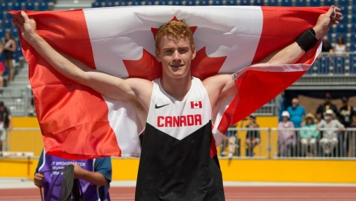 Shawnacy Barber celebrates gold in the men's pole vault