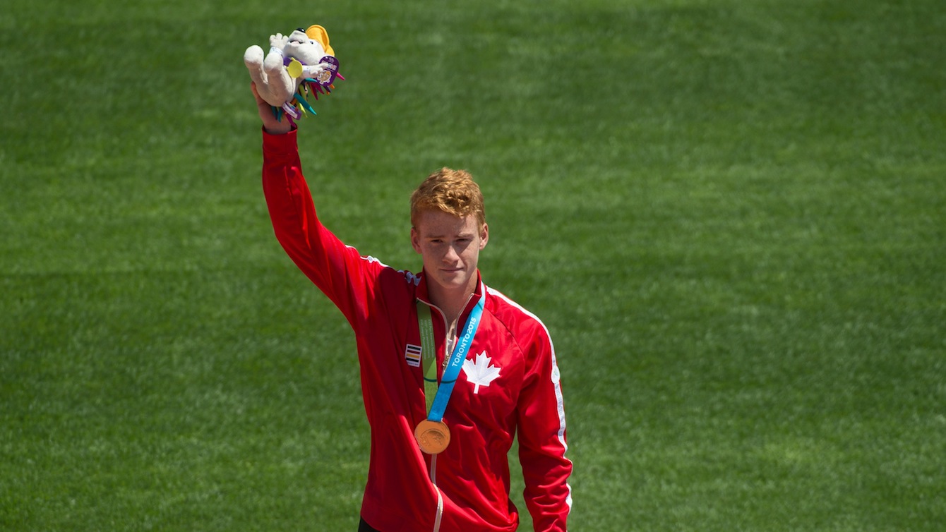 Shawn Barber celebrates gold in the men's pole vault at the Pan American Games in Toronto, July 21, 2015. 
