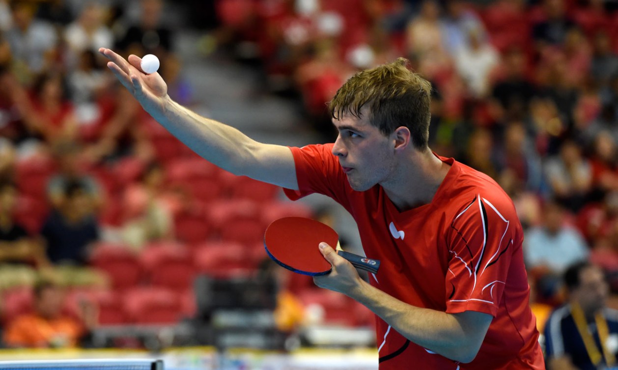 Marko Medjugorac keeps a close eye on the ball as he serves.