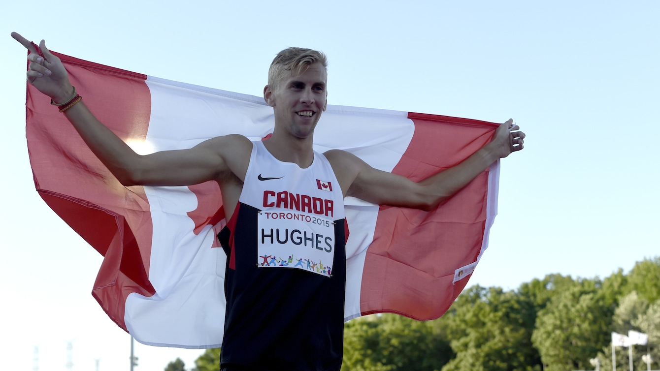Matt Hughes celebrates gold in the men's 3000m steeplechase