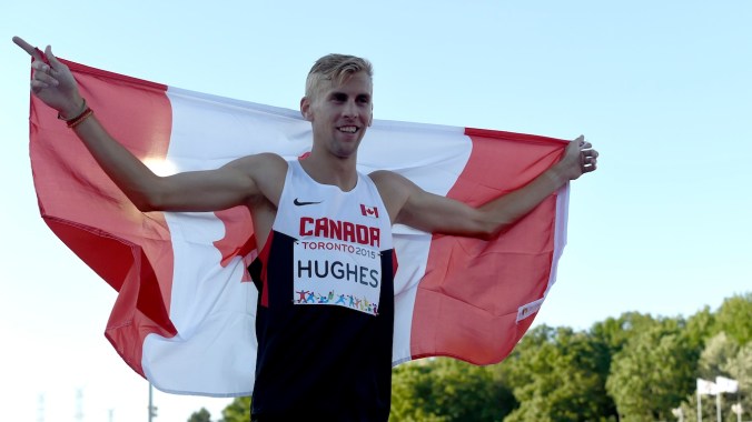 Matt Hughes celebrates gold in the men's 3000m steeplechase