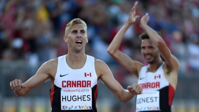 Matt Hughes and Alex Genest celebrate gold and silver, respectively, in the men's 3000m steeplechase