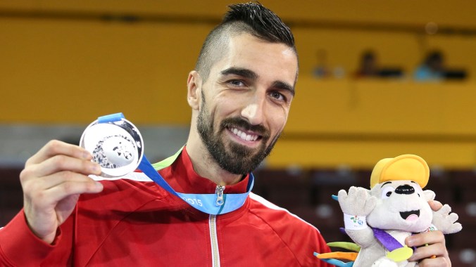 Maxime Potvin poses with his medal