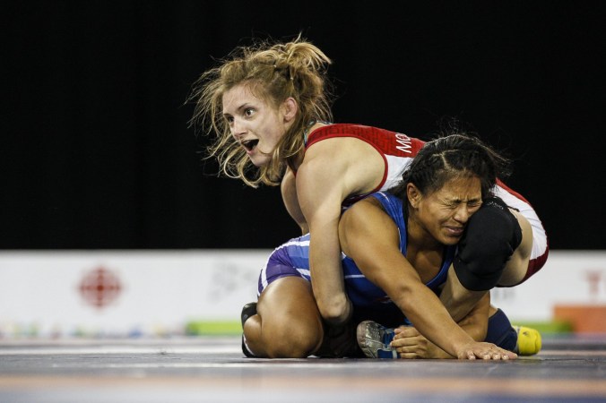 Genevieve Morrison realizing she won Pan Am wrestling gold on Thursday, July 16, 2015 (COC Photo by Michael P. Hall).