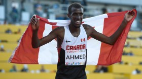 Mohammed Ahmed competes in the men's 10,000m race