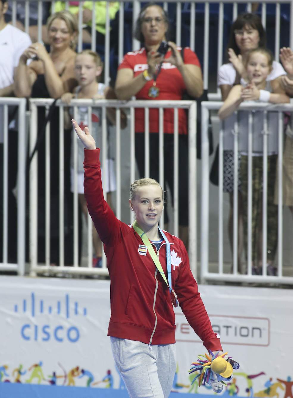 Ellie Black of Halifax waves to the crowd
