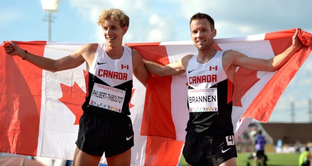 Nate Brannen and Charles Philibert-Thieboutot celebrating with Canadian flags